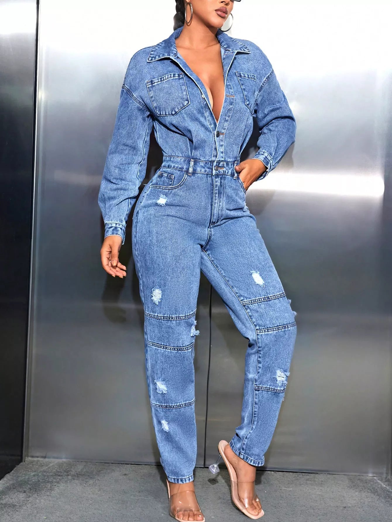 Distressed Long Sleeve Denim Jumpsuit.