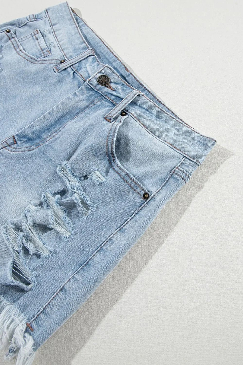 High waist denim shorts offering a stylish and comfortable summer fashion choice for women.