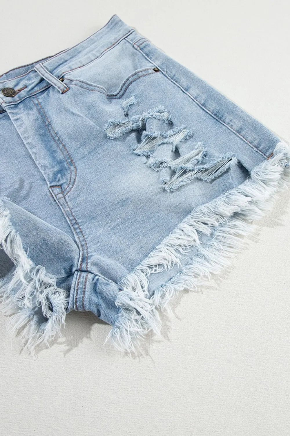 High waist denim shorts offering a stylish and comfortable summer fashion choice for women.