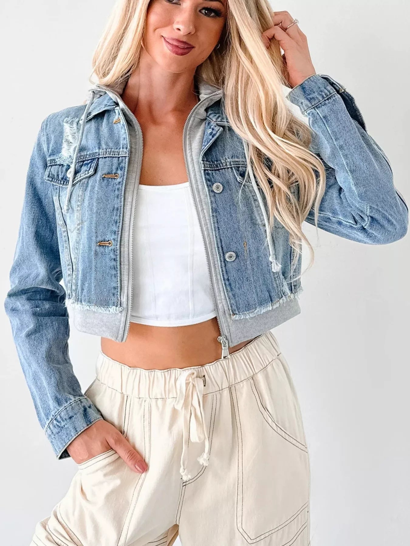 Distressed Zip Up Cropped Hooded Denim Jacket.