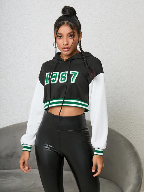 1987 Graphic Cropped Hoodie.