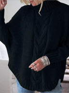 Cable-knit plus size sweater showcasing comfortable and stylish knitwear for all body types