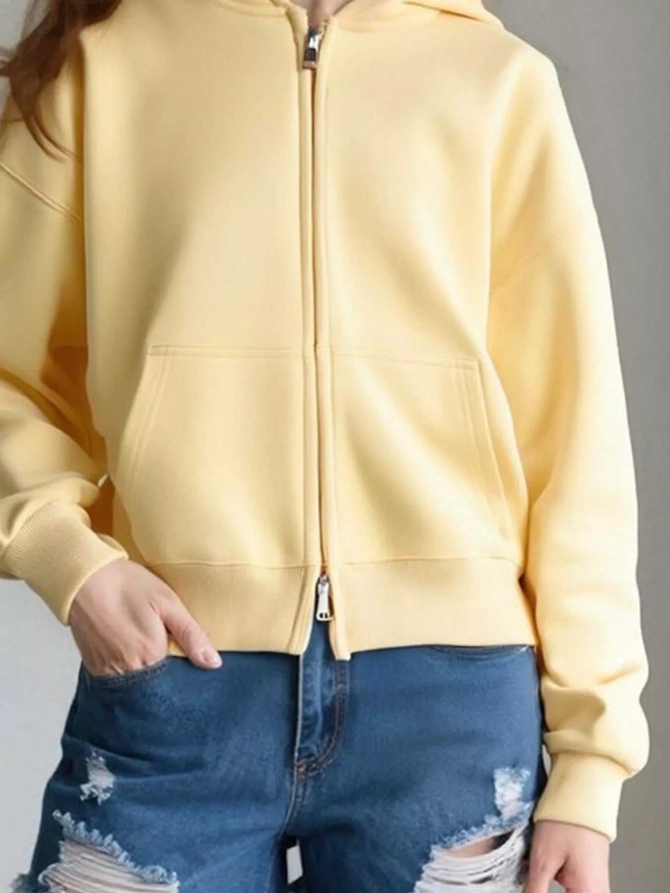 Plus size zip-up hoodie designed for comfort and style, perfect for casual wear and layering