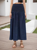 Elegant midi skirt with elastic waistband, perfect for formal and stylish occasions