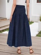 Elegant midi skirt with elastic waistband, perfect for formal and stylish occasions