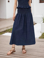 Elegant midi skirt with elastic waistband, perfect for formal and stylish occasions