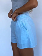 Comfortable elastic shorts designed for optimal fit and flexibility, perfect for activewear and casual outings.