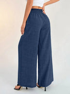 Elegant elastic waist wide leg pants perfect for a comfortable and stylish daily look.