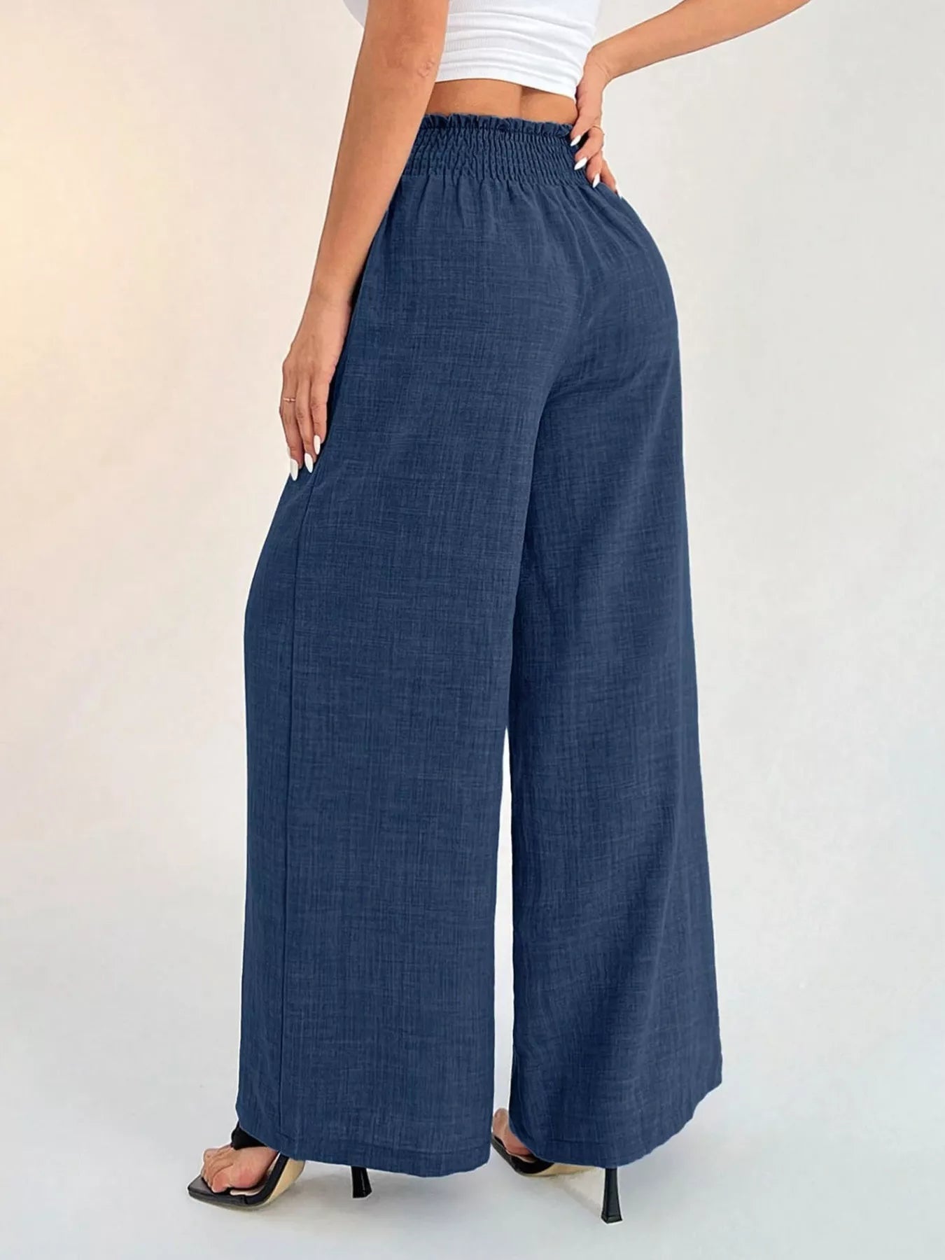 Elegant elastic waist wide leg pants perfect for a comfortable and stylish daily look.