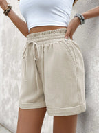 Stylish drawstring shorts for casual comfort and trendy summer wear, perfect for outdoor and leisure activities.