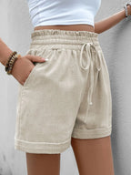 Stylish drawstring shorts for casual comfort and trendy summer wear, perfect for outdoor and leisure activities.