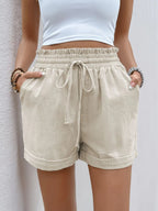 Stylish drawstring shorts for casual comfort and trendy summer wear, perfect for outdoor and leisure activities.