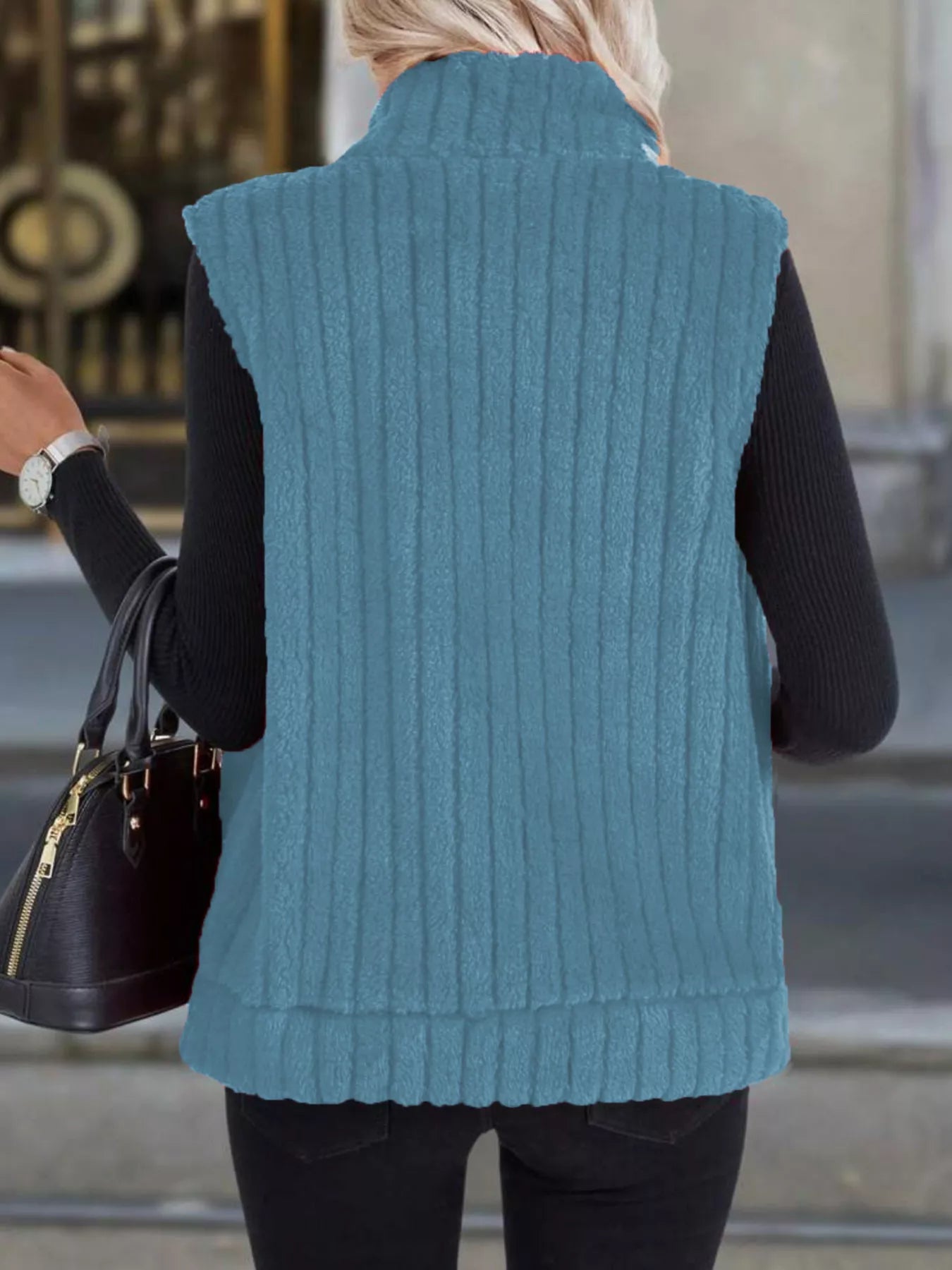 Plus size fleece vest providing warmth and style, ideal for layering in cooler weather