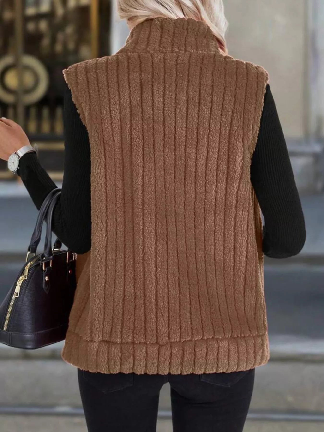 Plus size fleece vest providing warmth and style, ideal for layering in cooler weather