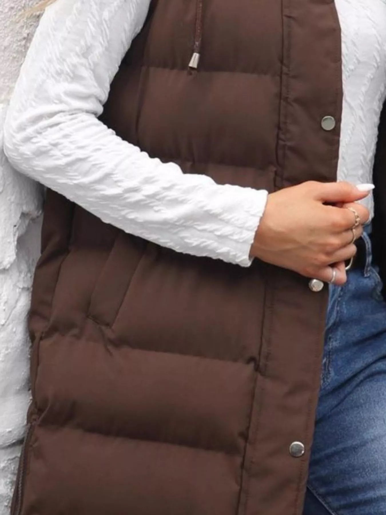 Plus size hooded padded vest providing warmth and style for comfortable outdoor wear.