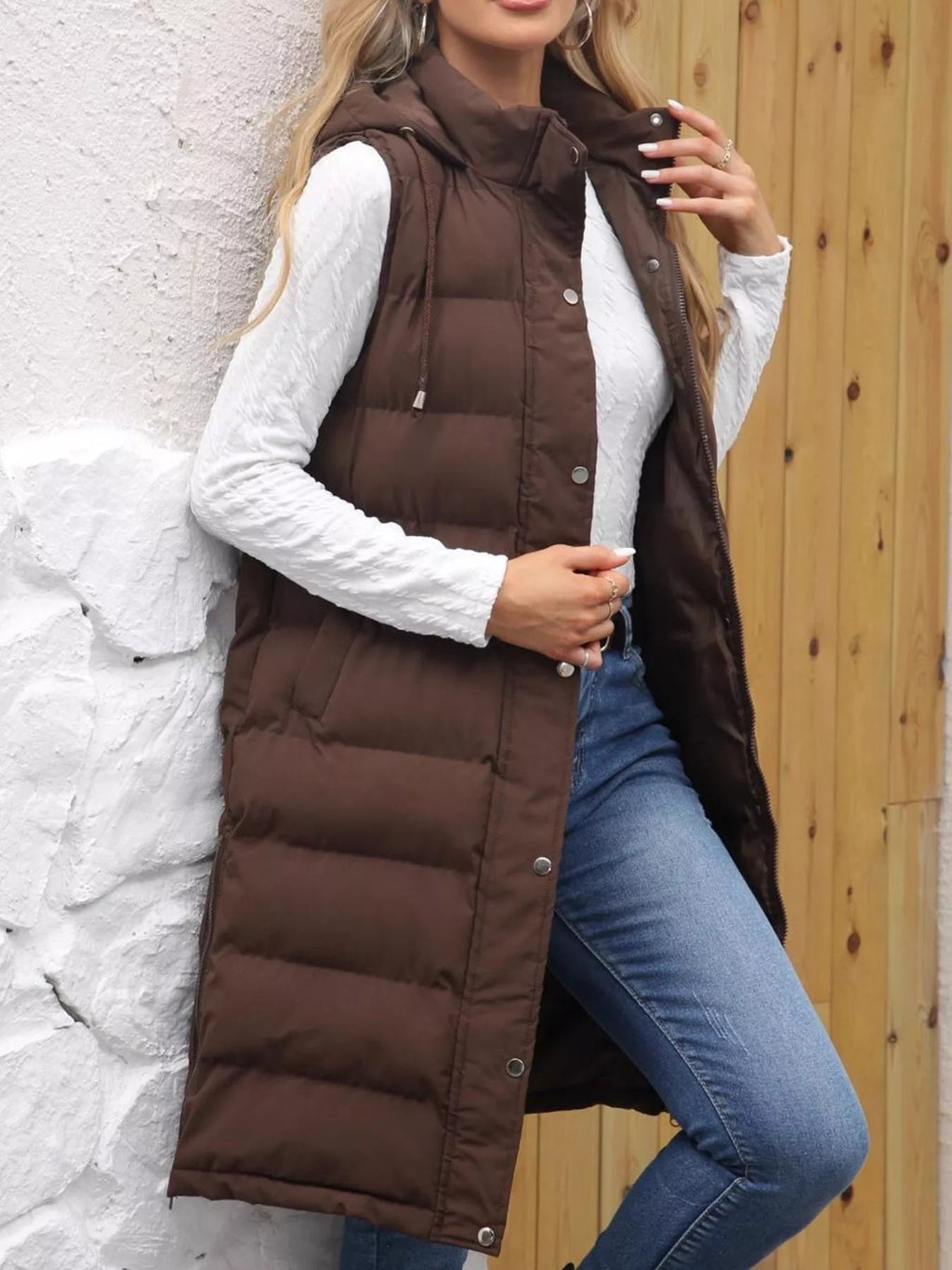 Plus size hooded padded vest providing warmth and style for comfortable outdoor wear.