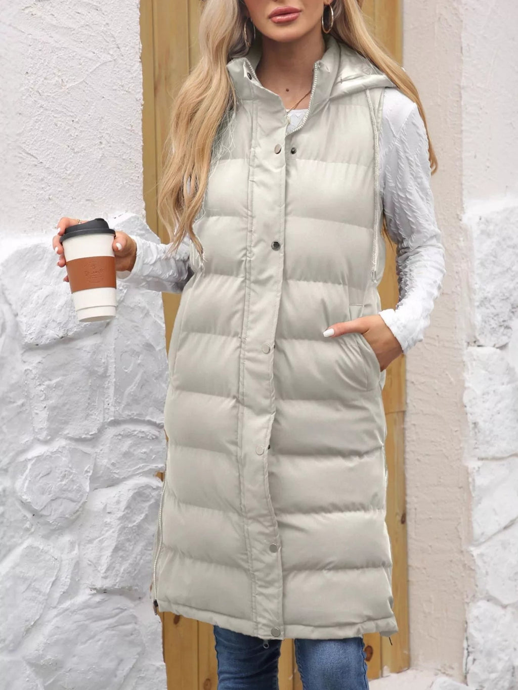 Plus size hooded padded vest providing warmth and style for comfortable outdoor wear.