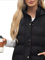 Plus size hooded padded vest providing warmth and style for comfortable outdoor wear.