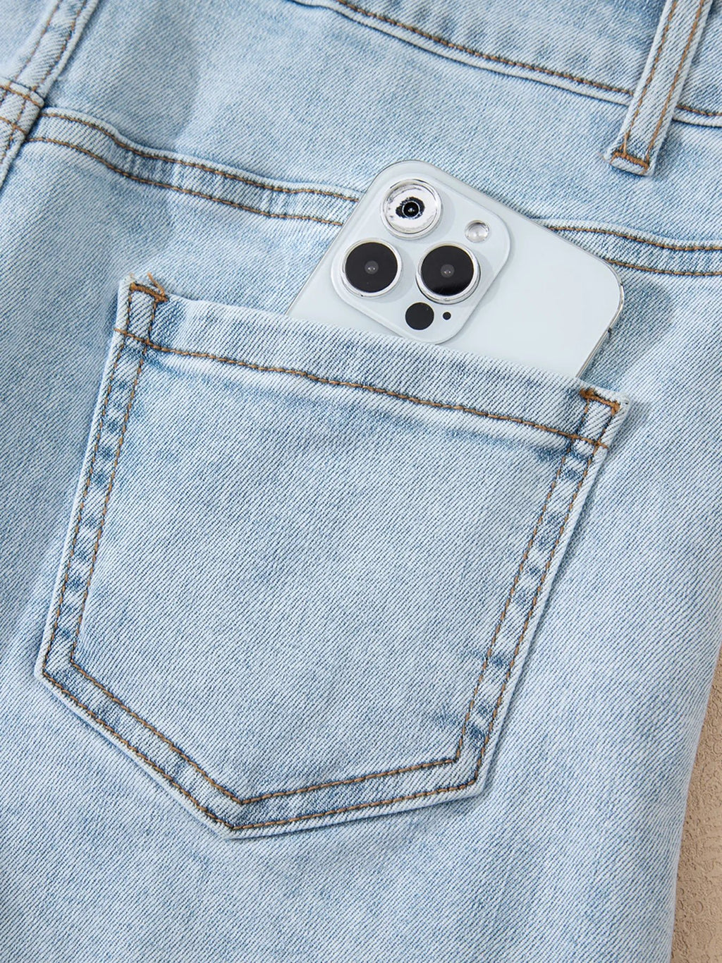 High rise denim shorts offering a stylish and comfortable fit for casual summer wear.