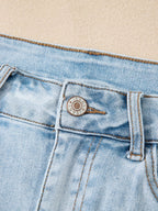 High rise denim shorts offering a stylish and comfortable fit for casual summer wear.
