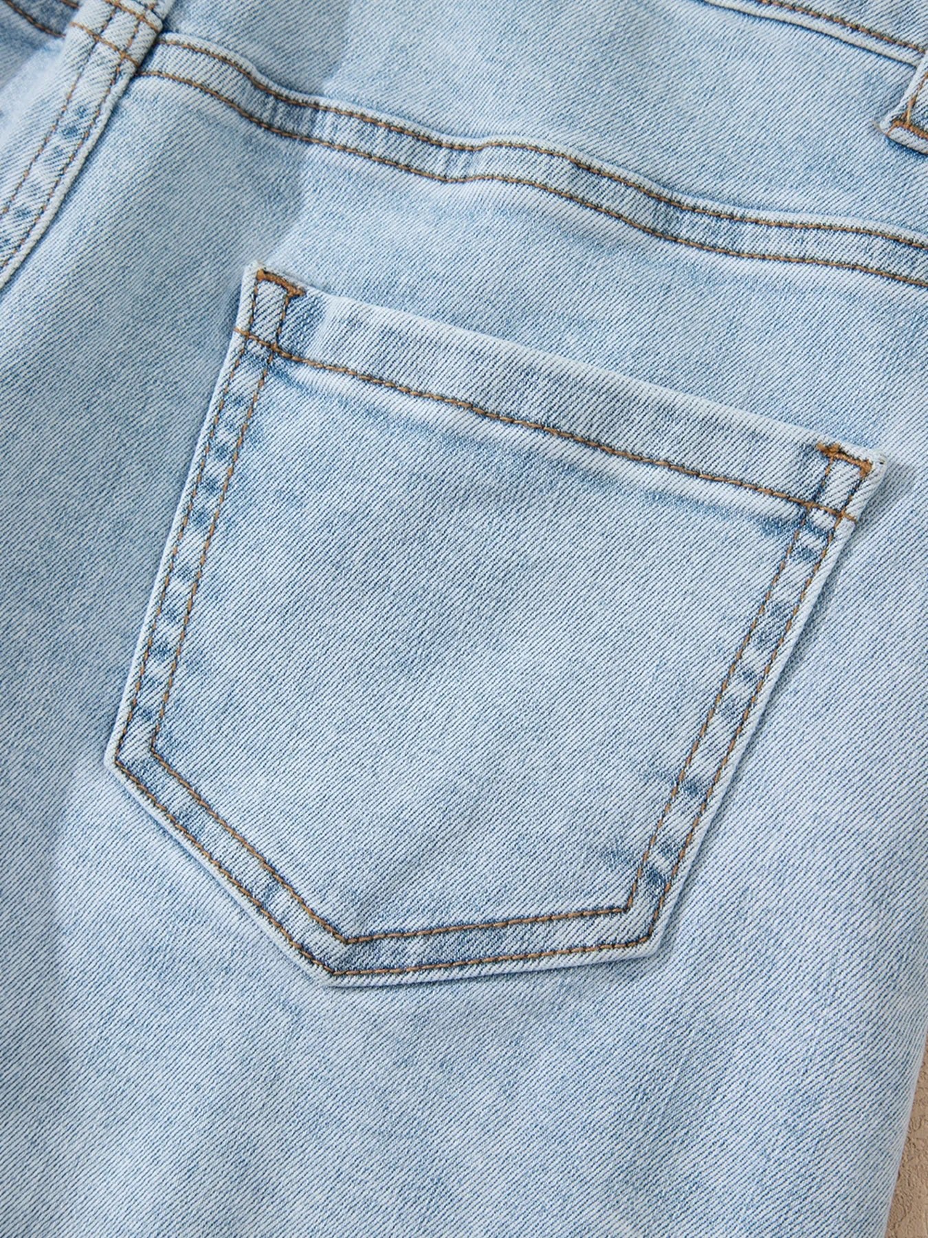 High rise denim shorts offering a stylish and comfortable fit for casual summer wear.