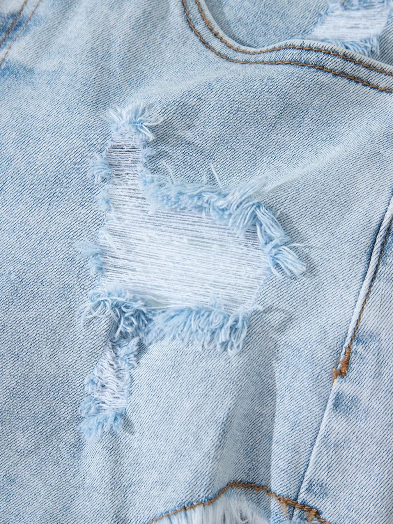 High rise denim shorts offering a stylish and comfortable fit for casual summer wear.