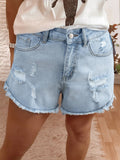 High rise denim shorts offering a stylish and comfortable fit for casual summer wear.