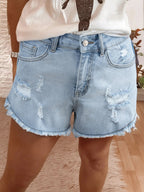 High rise denim shorts offering a stylish and comfortable fit for casual summer wear.