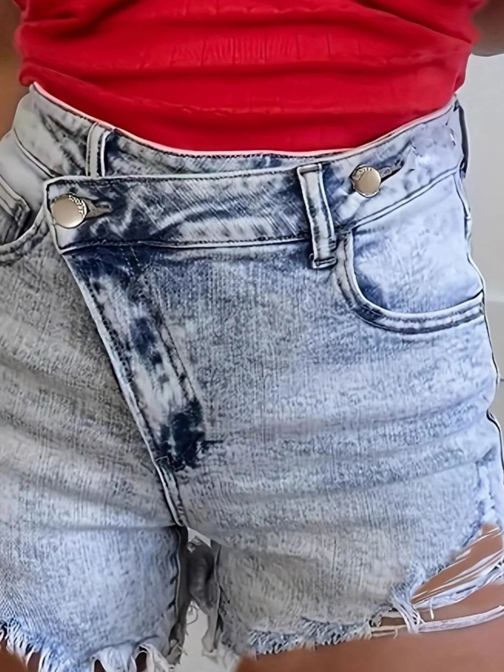 High waisted denim shorts providing a stylish and comfortable summer outfit option for casual wear