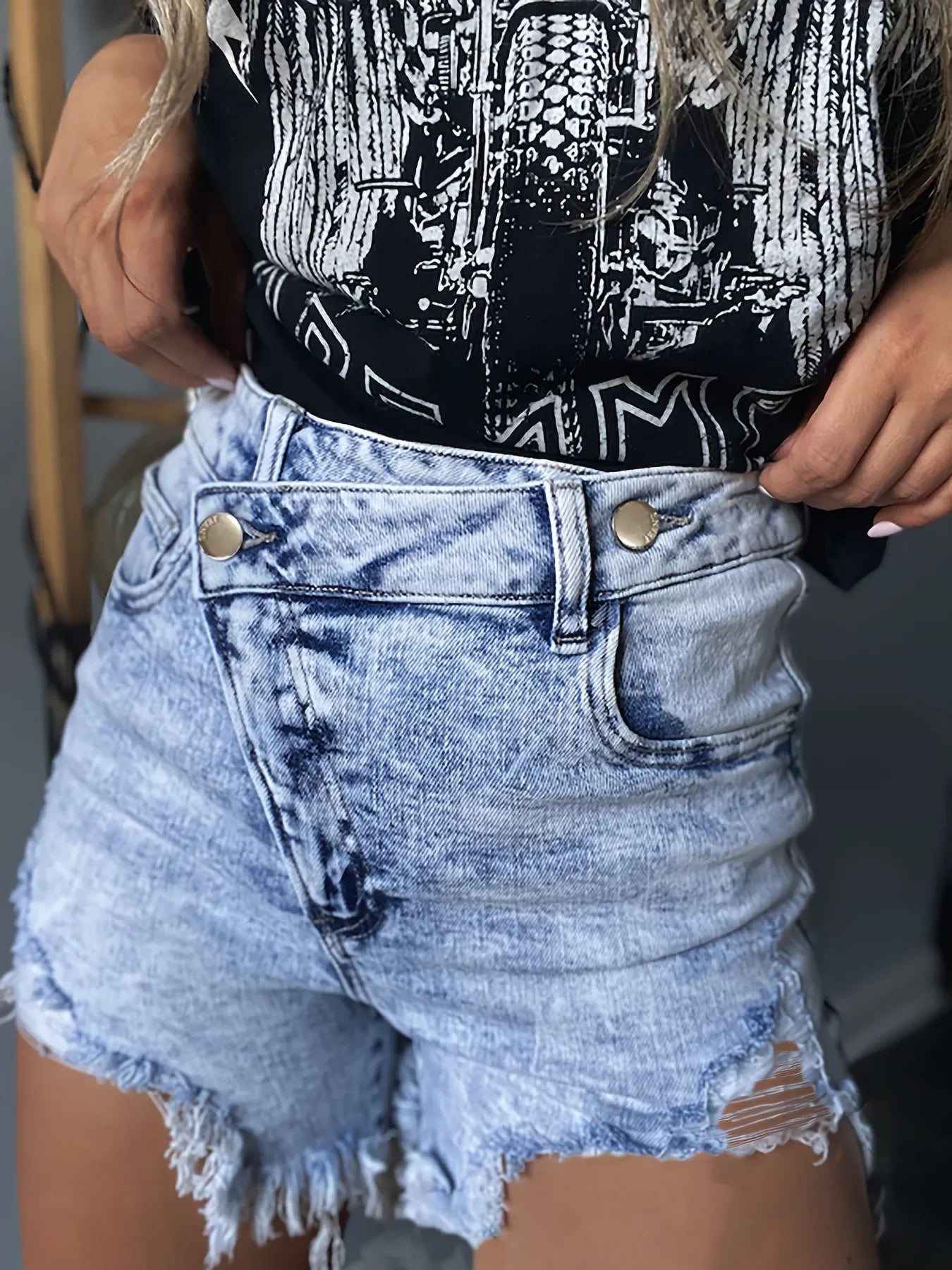 High waisted denim shorts providing a stylish and comfortable summer outfit option for casual wear