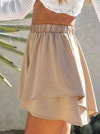 Elegant high-waisted layered shorts showcasing trendy summer fashion and comfortable style for women