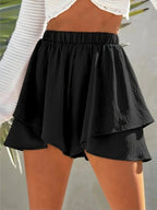 Elegant high-waisted layered shorts showcasing trendy summer fashion and comfortable style for women