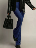 Elegant high-waisted flared pants perfect for a sophisticated and flattering silhouette in formal occasions.