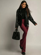 Elegant high-waisted flared pants perfect for a sophisticated and flattering silhouette in formal occasions.