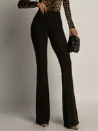 Elegant high-waisted flared pants perfect for a sophisticated and flattering silhouette in formal occasions.