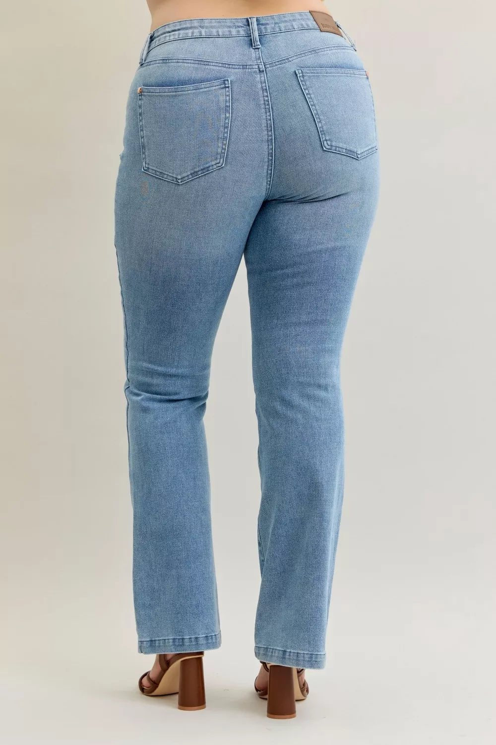 Stylish plus size bootcut jeans offering a comfortable and flattering fit for all-day wear.