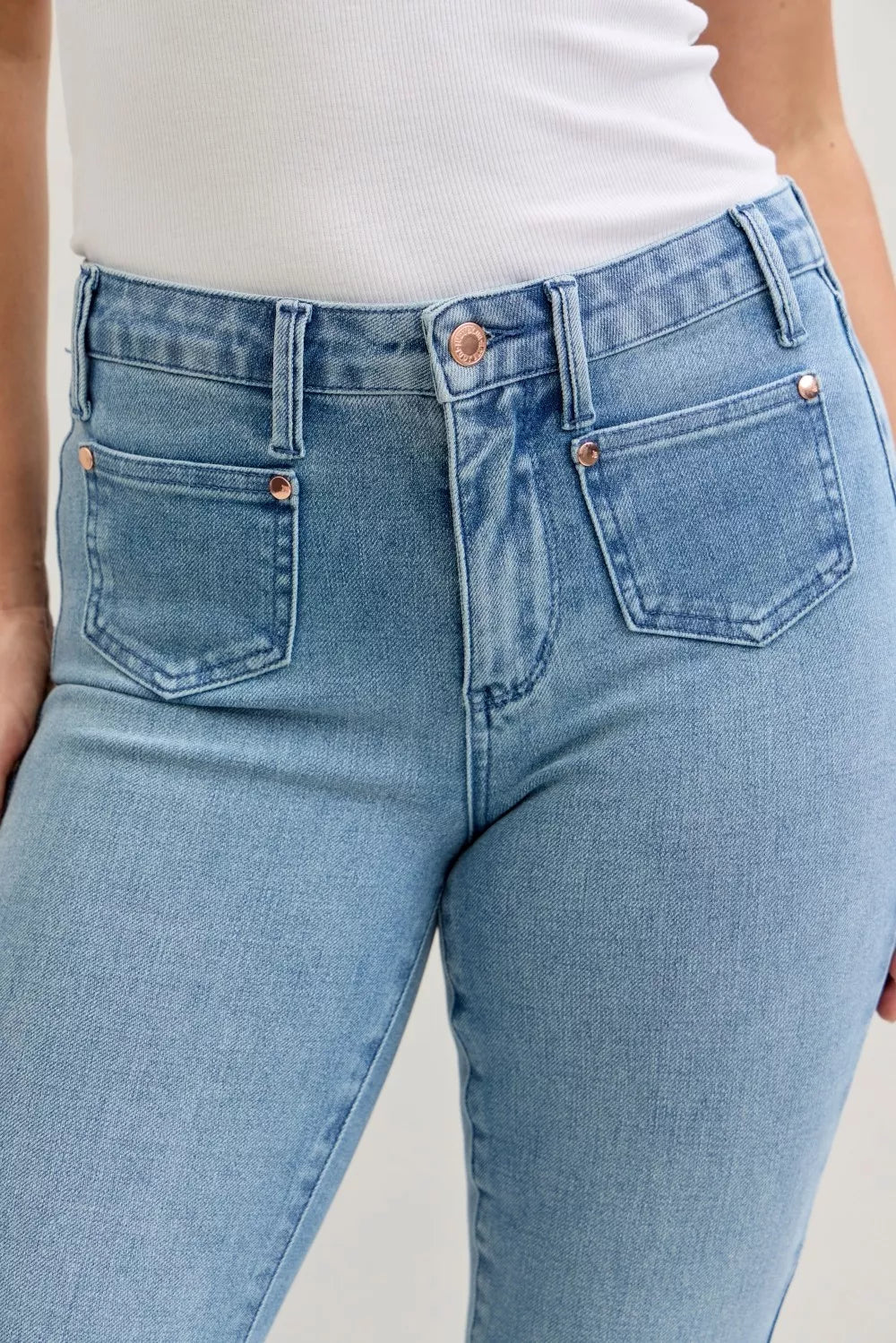 Stylish plus size bootcut jeans offering a comfortable and flattering fit for all-day wear.