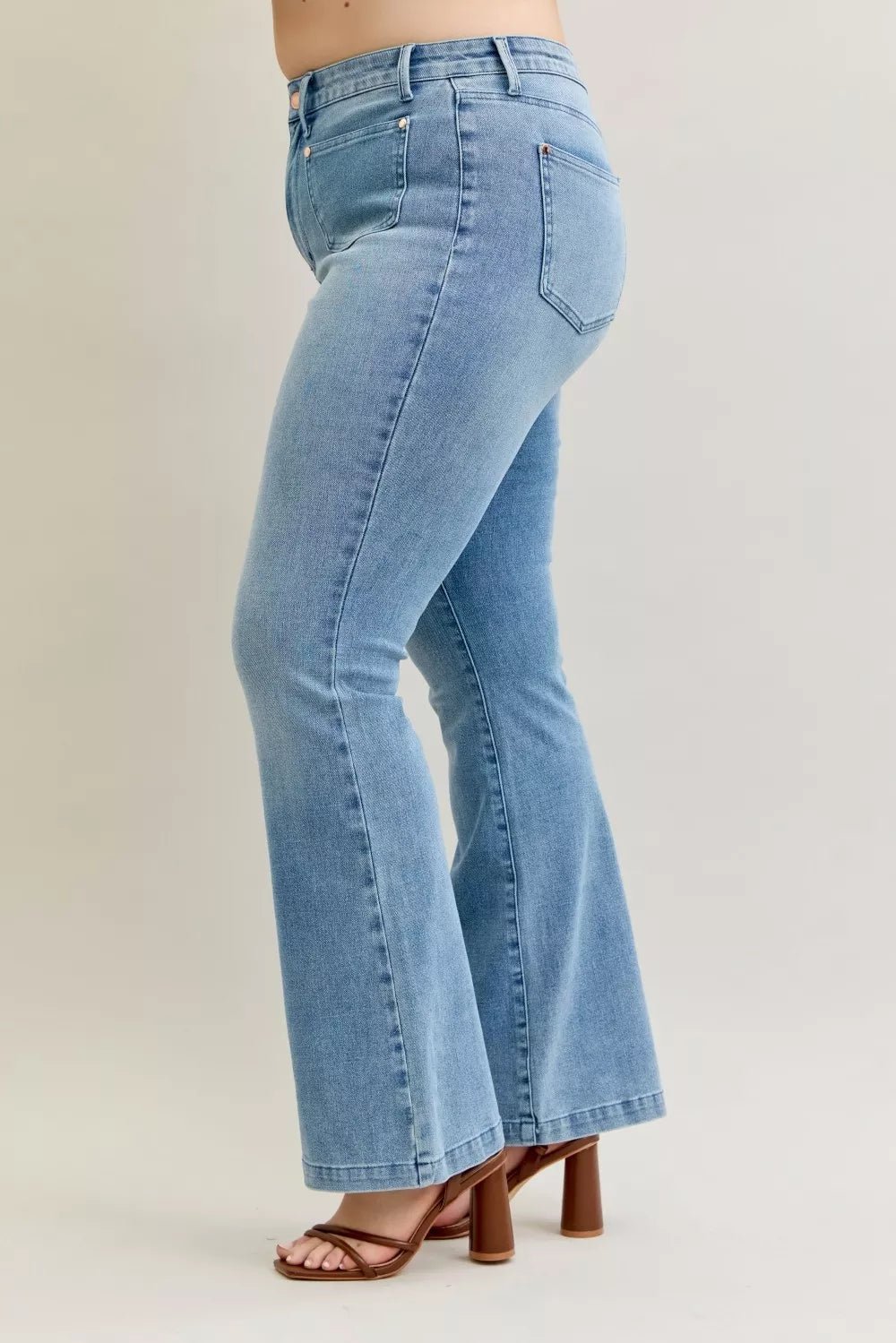 Stylish plus size bootcut jeans offering a comfortable and flattering fit for all-day wear.