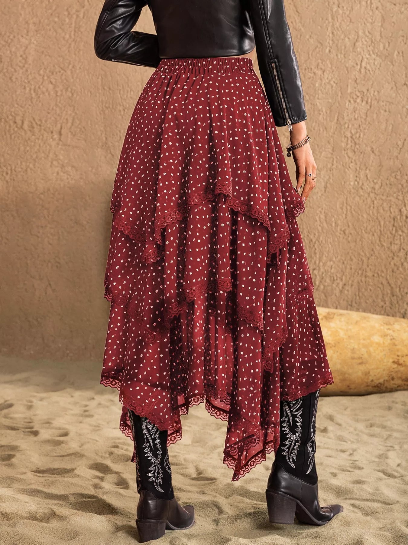 Elegant layered lace skirt showcasing intricate craftsmanship and sophisticated design for formal occasions