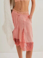 Elegant lace shorts showcasing intricate detailing and sophisticated style for a refined summer wardrobe.