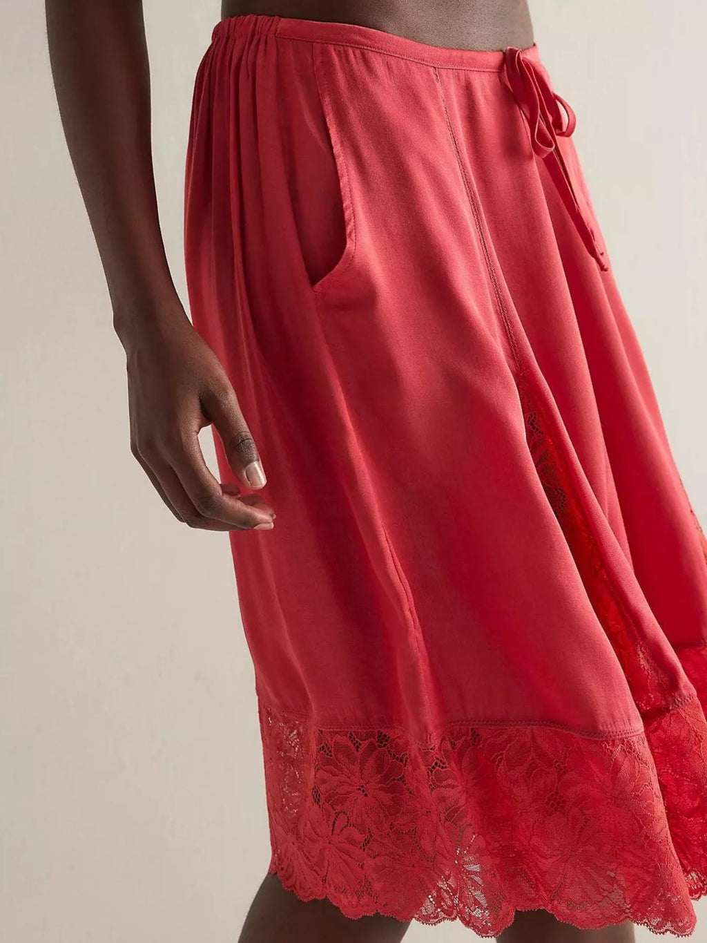 Elegant lace shorts showcasing intricate detailing and sophisticated style for a refined summer wardrobe.