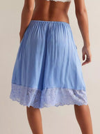 Elegant lace shorts showcasing intricate detailing and sophisticated style for a refined summer wardrobe.
