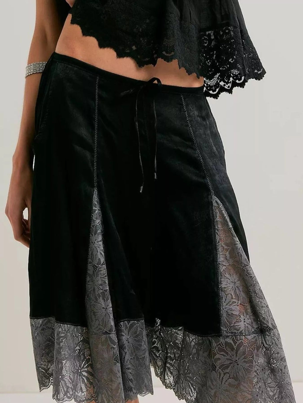 Elegant lace shorts showcasing intricate detailing and sophisticated style for a refined summer wardrobe.