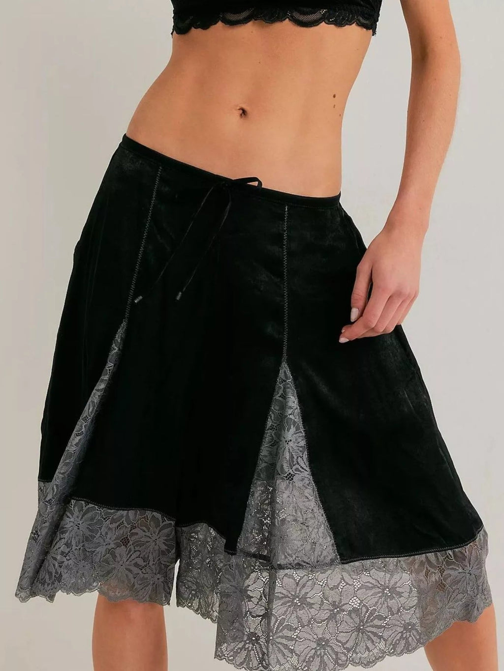 Elegant lace shorts showcasing intricate detailing and sophisticated style for a refined summer wardrobe.