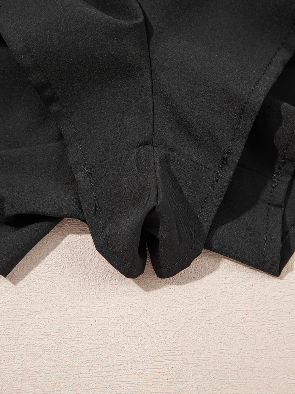 Elegant ruffle shorts perfect for formal occasions, combining style and comfort with a chic design.