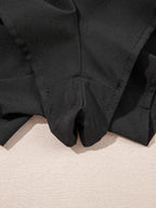 Elegant ruffle shorts perfect for formal occasions, combining style and comfort with a chic design.