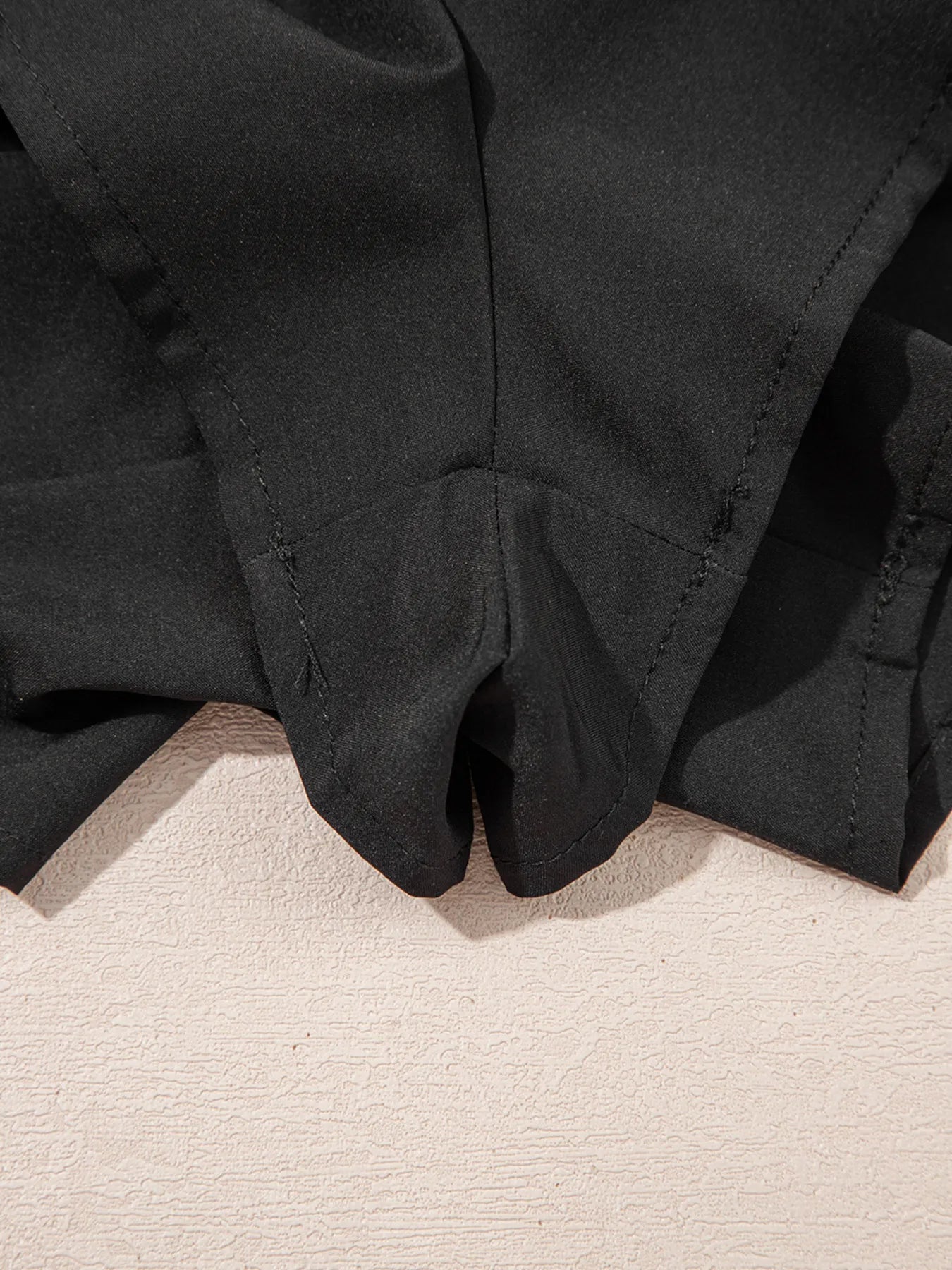 Elegant ruffle shorts perfect for formal occasions, combining style and comfort with a chic design.