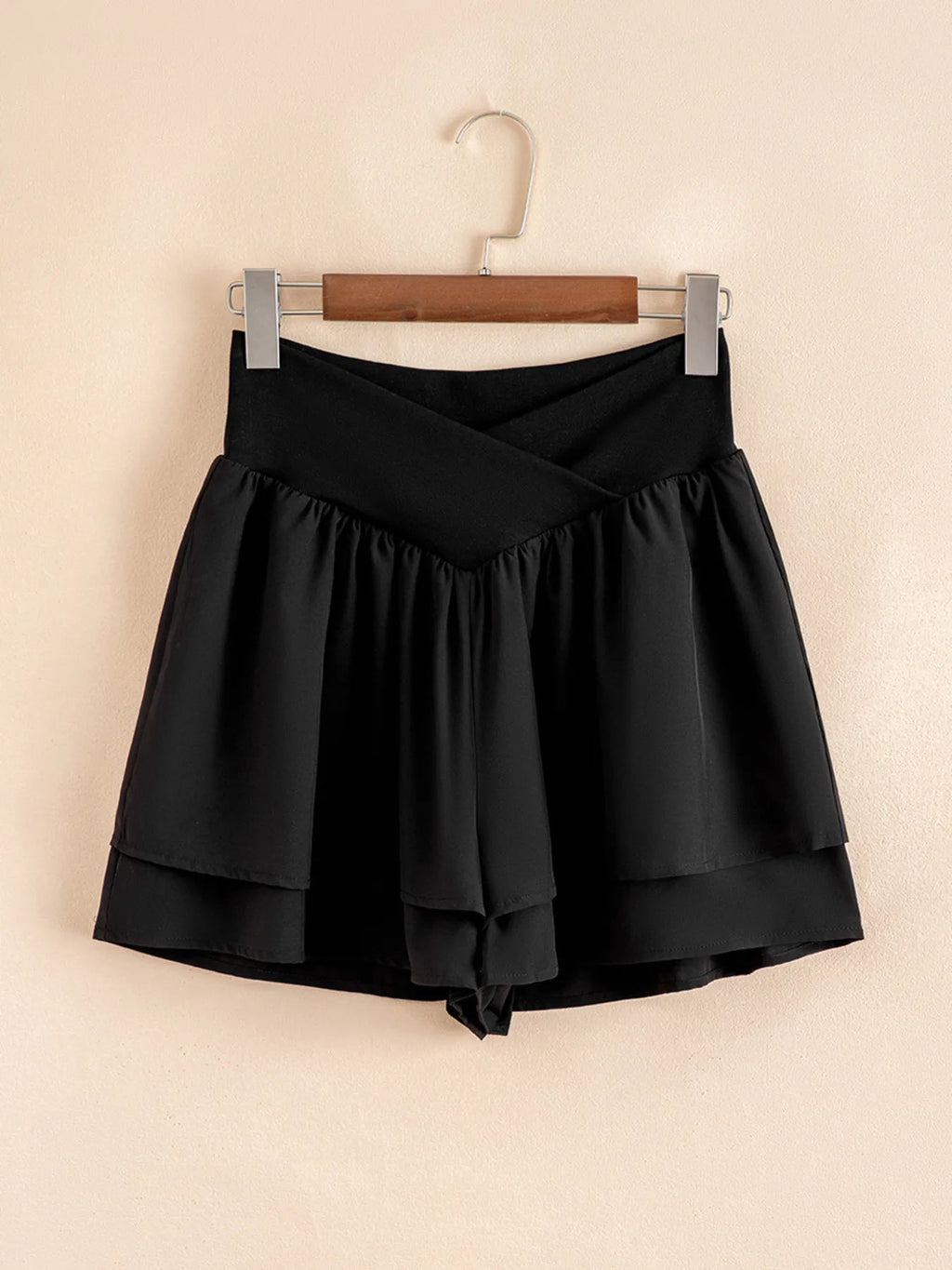 Elegant ruffle shorts perfect for formal occasions, combining style and comfort with a chic design.
