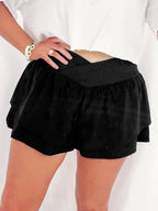 Elegant ruffle shorts perfect for formal occasions, combining style and comfort with a chic design.