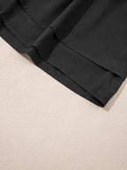 Elegant ruffle shorts perfect for formal occasions, combining style and comfort with a chic design.